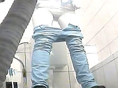 Adorable young chick shot on cam by a toilet spy voyeur video #3