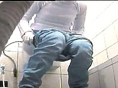 Heavily clothed hos take panties off in public WC voyeur video #1