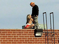 Lucky bastard gets a nasty blowjob on the rooftop voyeur video #2