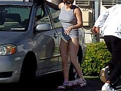 Hot chick loses top in parking lot! voyeur video #2