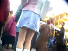 Amazing upskirt pictures featuring pretty the babe caught just in street voyeur video #1