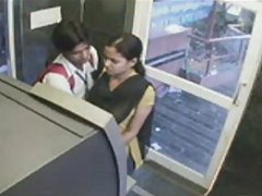 Couple kissing in telephone buth voyeur video #2