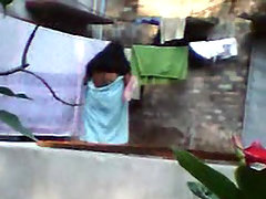 Desi wife taking shower in open air voyeur video #3