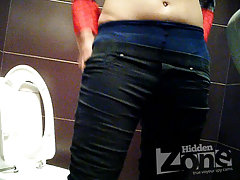 The girl in black jeans pissing standing up. She demonstrates directly into the camera her shaved pussy. voyeur video #4